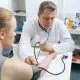 doctor measures the blood pressure