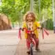 happy girl riding a pink bicycle in the park 2024 12 09 04 55 39 utc