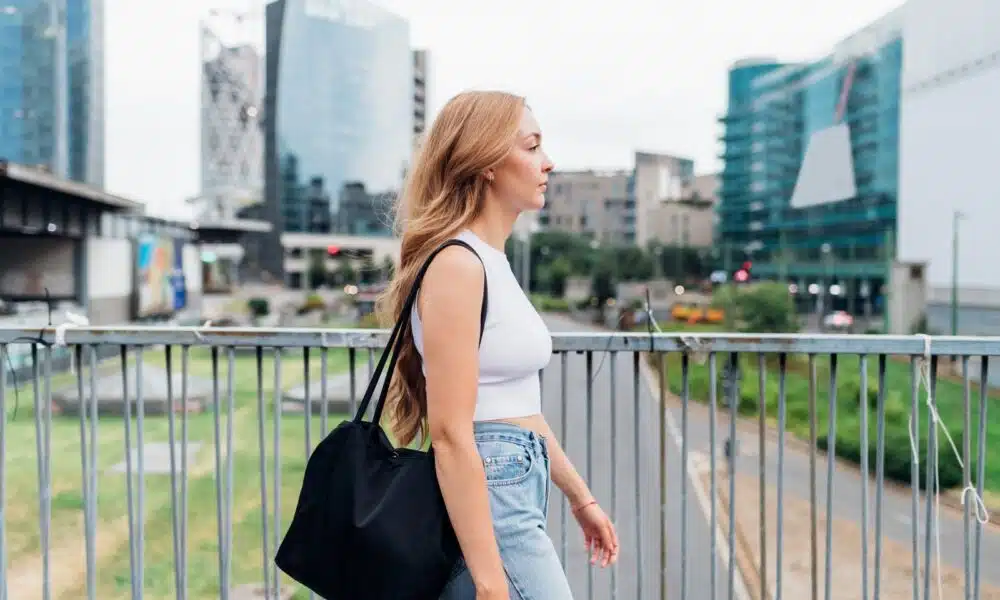 young woman caucasian walking outdoor going to wor 2024 10 18 01 30 03 utc