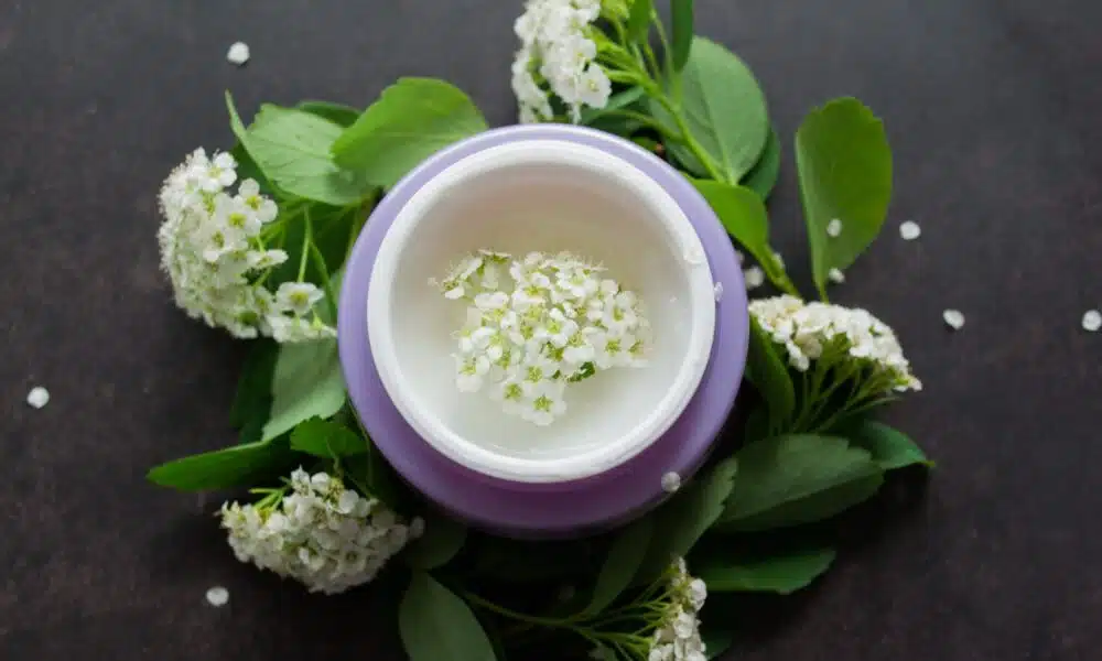 elegant cream jar with delicate white flowers 2026 03 16 01 15 29 utc