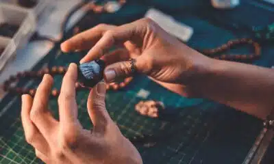 hands holding shiny stone for artistic jewelry des 2026 03 17 03 29 50 utc
