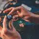 hands holding shiny stone for artistic jewelry des 2026 03 17 03 29 50 utc